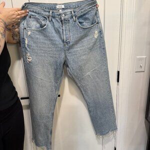 nuuds Jeans with Distressing and Distressed Hem